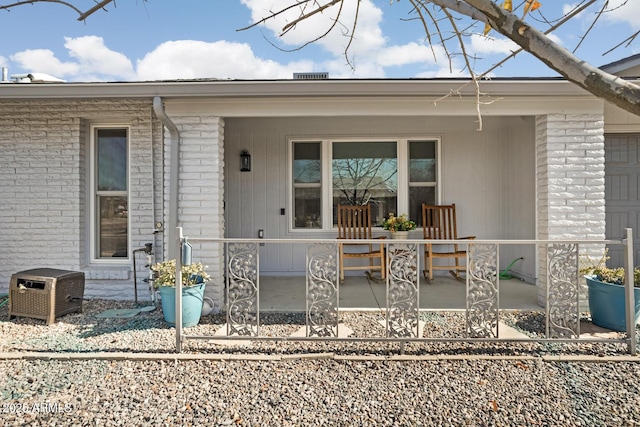 property entrance with a porch