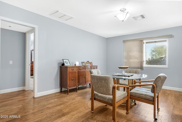 dining room featuring hardwood / wood-style flooring