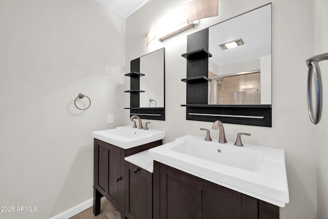 bathroom featuring an enclosed shower and vanity