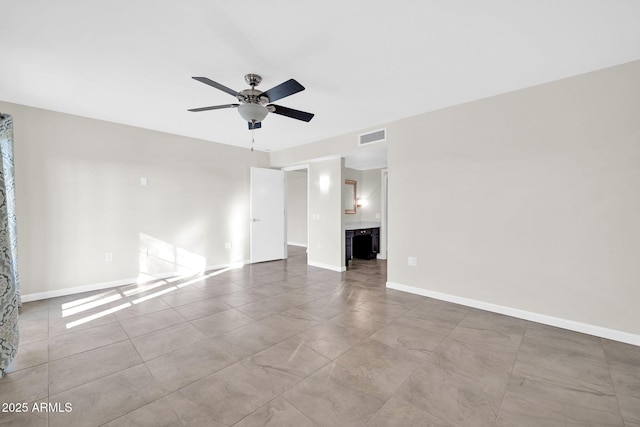 unfurnished living room with ceiling fan