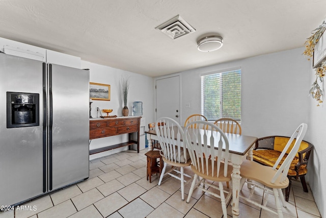 view of tiled dining area