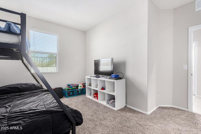 bedroom featuring carpet, visible vents, and baseboards