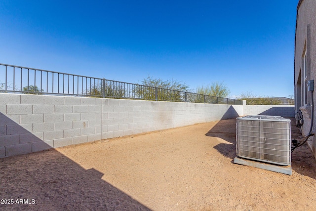 view of yard featuring cooling unit and a fenced backyard