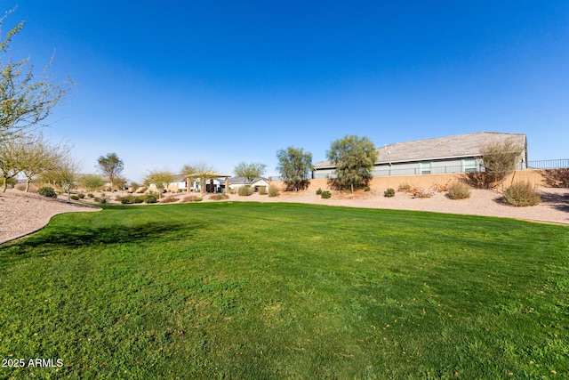 view of yard featuring fence