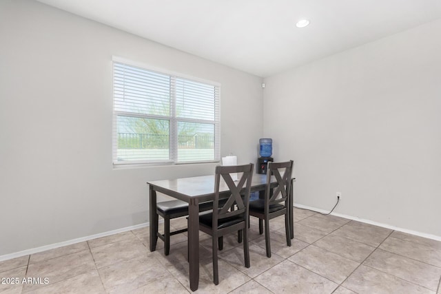 dining area with light tile patterned floors, recessed lighting, and baseboards