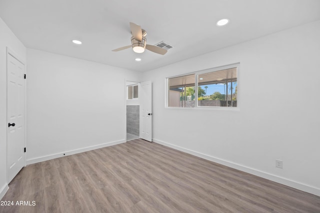 unfurnished bedroom featuring ceiling fan and wood-type flooring