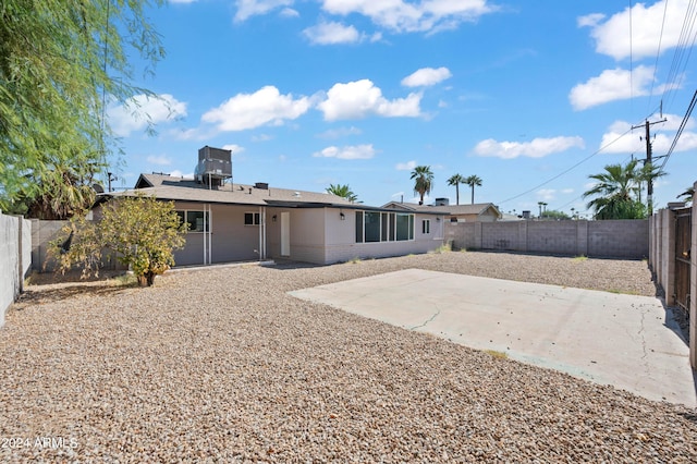 rear view of house with a patio area