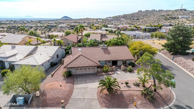 drone / aerial view featuring a mountain view