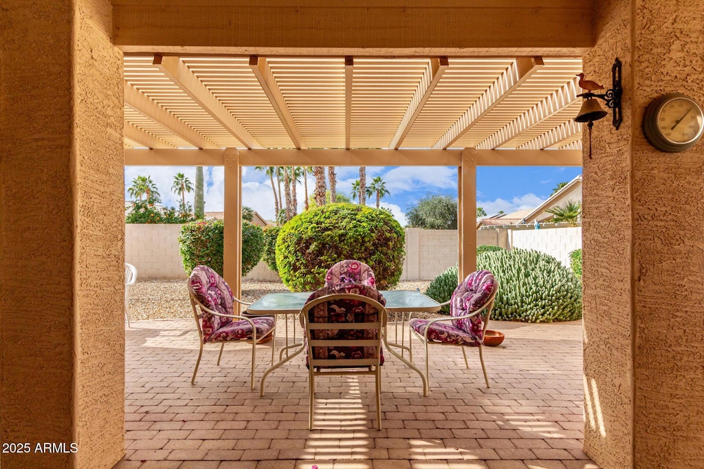 view of patio featuring a pergola