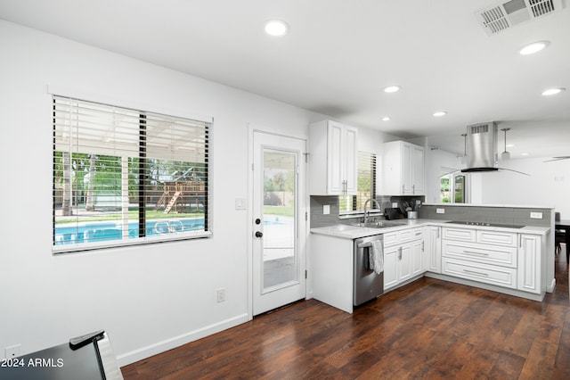 kitchen with white cabinets, island exhaust hood, stainless steel dishwasher, and dark wood-type flooring