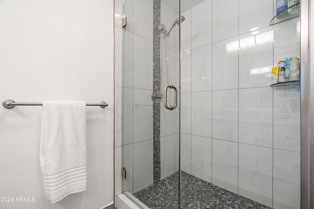 bathroom with an enclosed shower