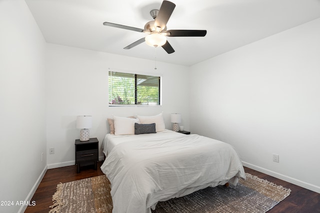 bedroom featuring dark wood-type flooring and ceiling fan