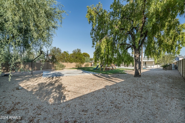 view of yard with a playground