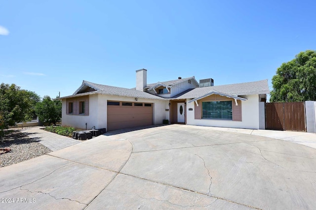 single story home with a garage