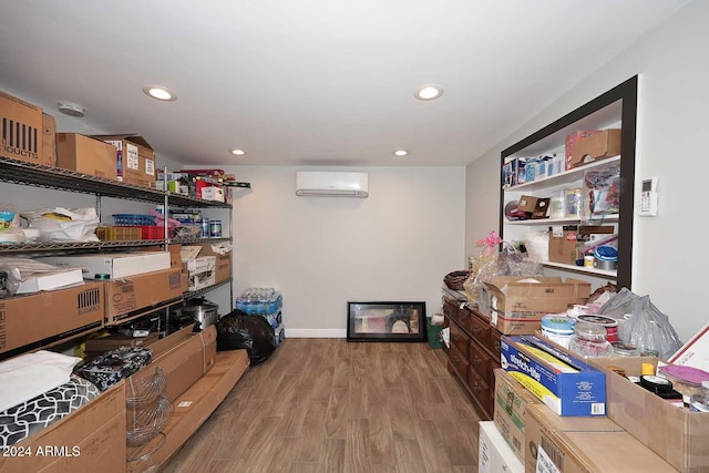 storage room with a wall mounted AC