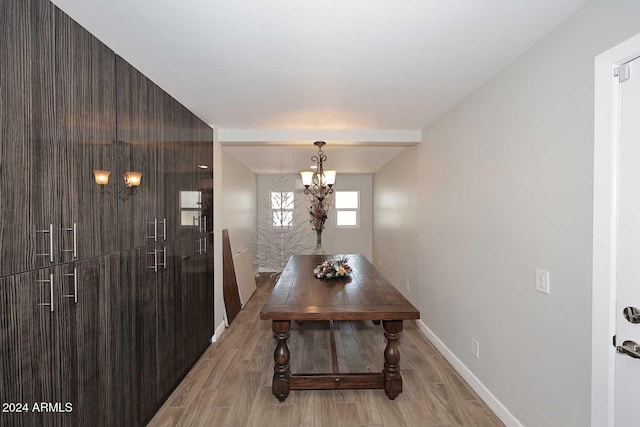 dining area featuring a notable chandelier