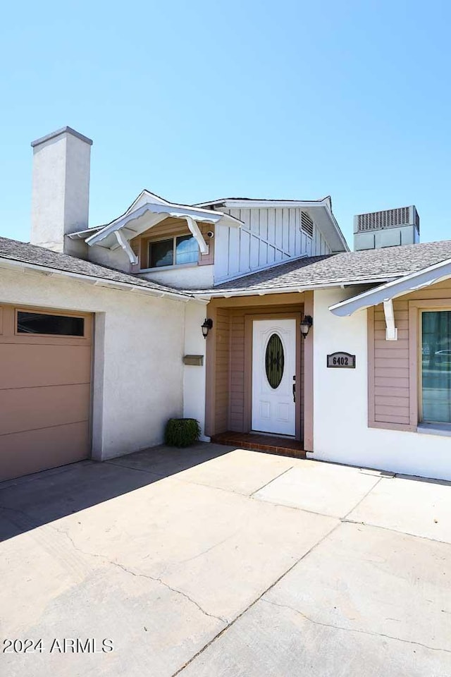 view of front of property with a garage