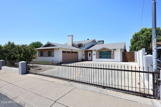 ranch-style home with a garage