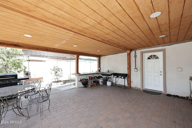 view of patio featuring a grill