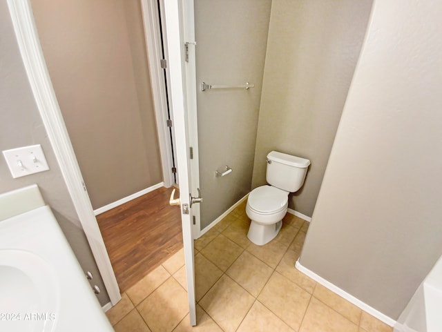 bathroom with tile patterned floors, vanity, and toilet