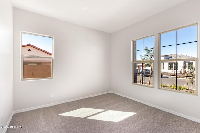 view of carpeted spare room