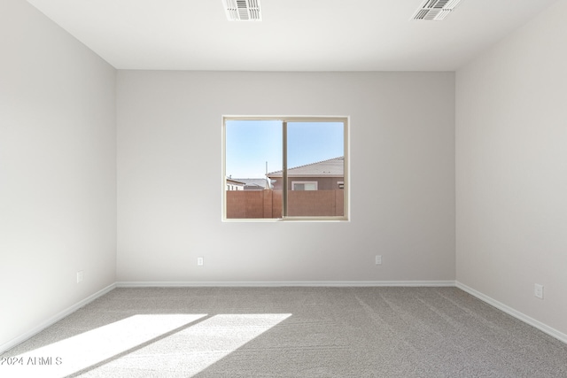 view of carpeted spare room