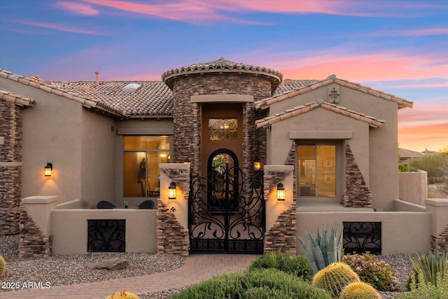 34096 N 87th Way, Scottsdale, AZ 85266 - entrance to property with fence, stucco siding, a tiled roof, and stone siding