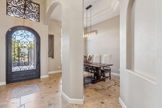 34096 N 87th Way, Scottsdale, AZ 85266 - tiled entrance foyer featuring arched walkways and baseboards