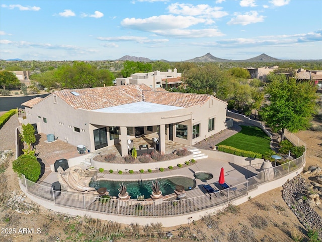 34096 N 87th Way, Scottsdale, AZ 85266 - back of property featuring a mountain view, a fenced backyard, a fenced in pool, and a patio area