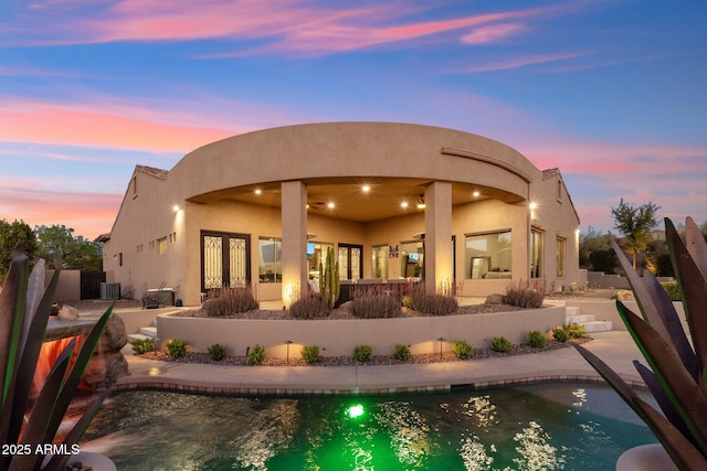 34096 N 87th Way, Scottsdale, AZ 85266 - back of property featuring a patio, an outdoor pool, stucco siding, french doors, and fence