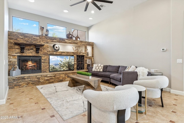 34096 N 87th Way, Scottsdale, AZ 85266 - living area featuring ceiling fan, visible vents, baseboards, recessed lighting, and a stone fireplace