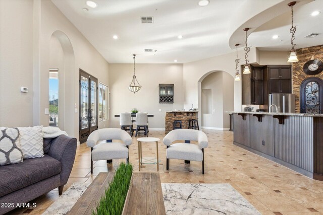 34096 N 87th Way, Scottsdale, AZ 85266 - living area with visible vents, recessed lighting, and arched walkways