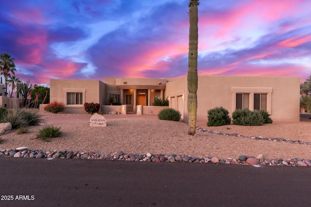 24801 N Vado Ct, Rio Verde, AZ 85263 - pueblo-style house with an attached garage and stucco siding