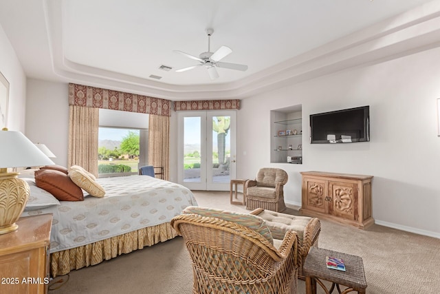 24801 N Vado Ct, Rio Verde, AZ 85263 - bedroom with carpet flooring, access to outside, baseboards, a tray ceiling, and french doors