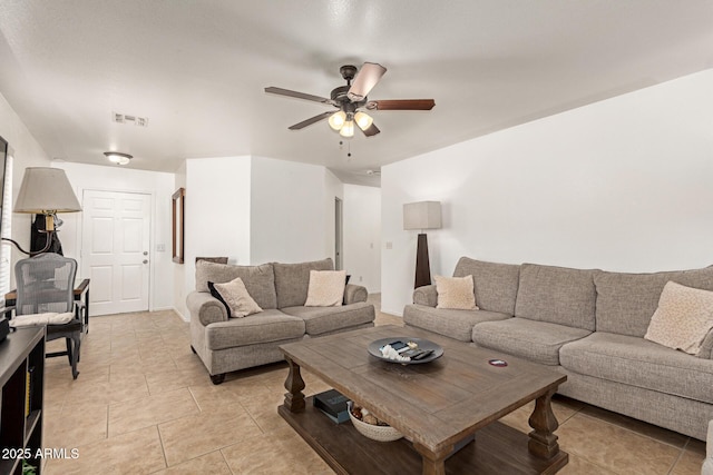 2202 S Lawther Dr, Apache Junction, AZ 85120 - living room with ceiling fan and light tile patterned flooring