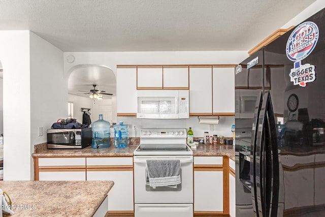 2202 S Lawther Dr, Apache Junction, AZ 85120 - kitchen with white appliances, white cabinets, a ceiling fan, and a textured ceiling