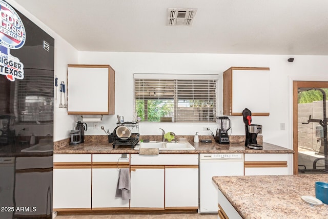 2202 S Lawther Dr, Apache Junction, AZ 85120 - kitchen with dishwasher and white cabinets