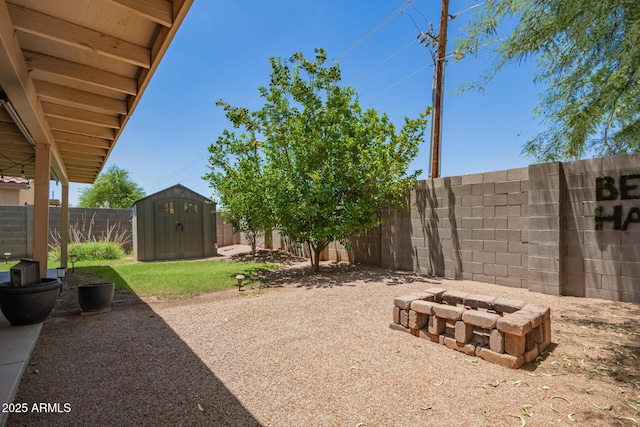 2202 S Lawther Dr, Apache Junction, AZ 85120 - fenced backyard featuring a storage shed and a fire pit