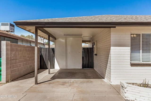 view of patio / terrace with cooling unit and fence