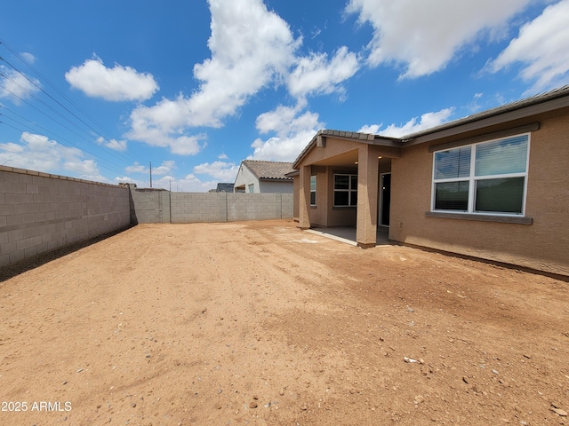 37371 W San Sisto Ave, Maricopa, AZ 85138 - fenced backyard with a patio area