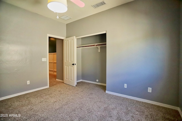 unfurnished bedroom with carpet, baseboards, and visible vents