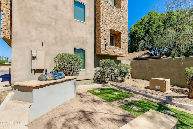312 S Hardy Dr Unit 106, Tempe, AZ 85281 - view of patio / terrace with exterior kitchen