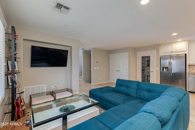 312 S Hardy Dr Unit 106, Tempe, AZ 85281 - living room with recessed lighting and baseboards