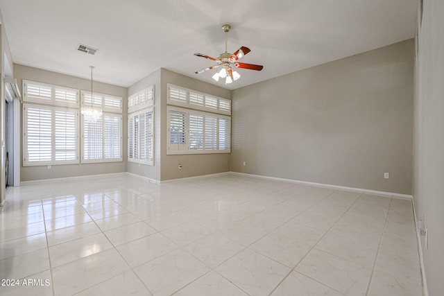 spare room featuring ceiling fan