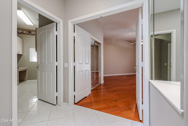 hallway featuring light wood-type flooring