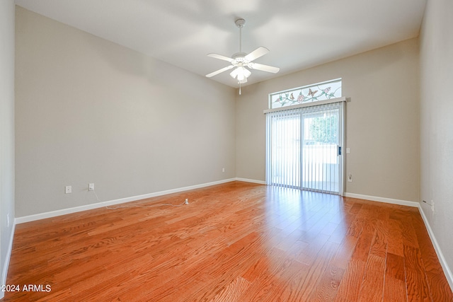 unfurnished room with light hardwood / wood-style floors and ceiling fan