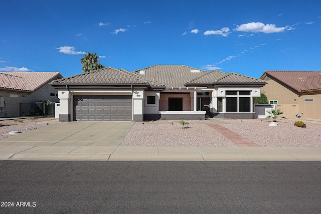 view of front of home featuring a garage