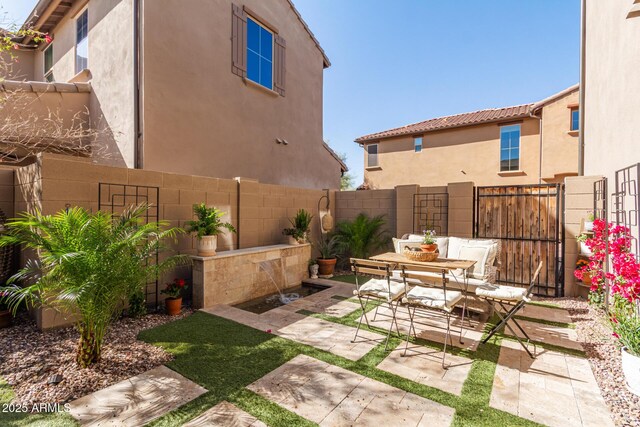 view of patio / terrace featuring a fenced backyard