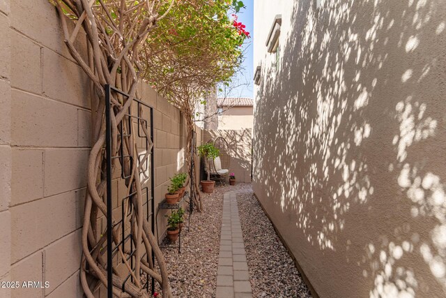 view of property exterior featuring a fenced backyard