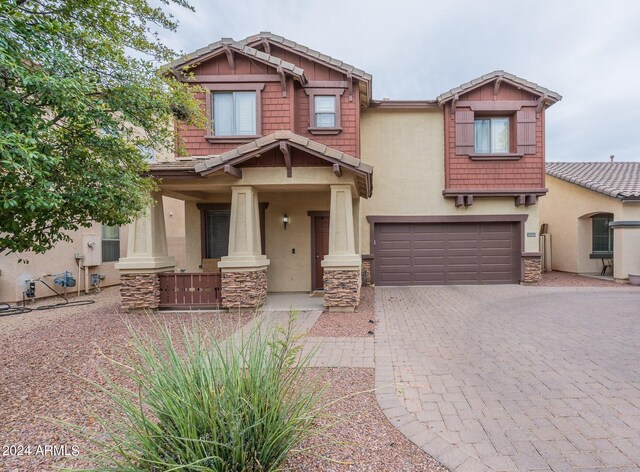 craftsman-style house featuring a garage